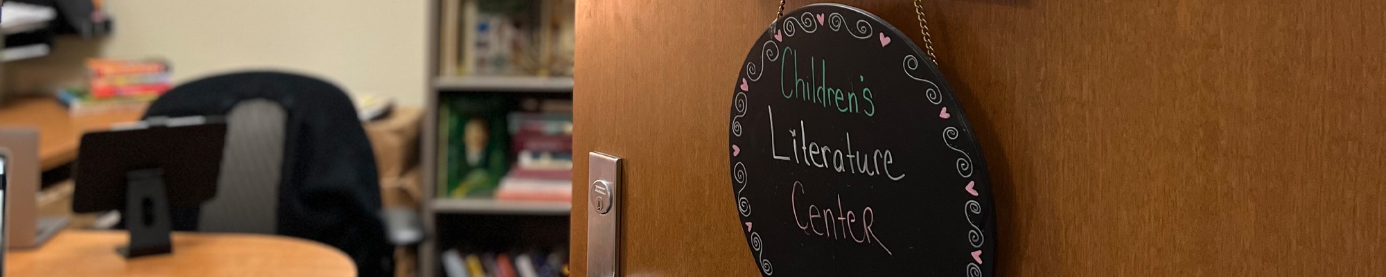 up close of Center door with sign Children's Literature Center